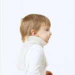 Elio, age 3, sports a mini freddie in blanc