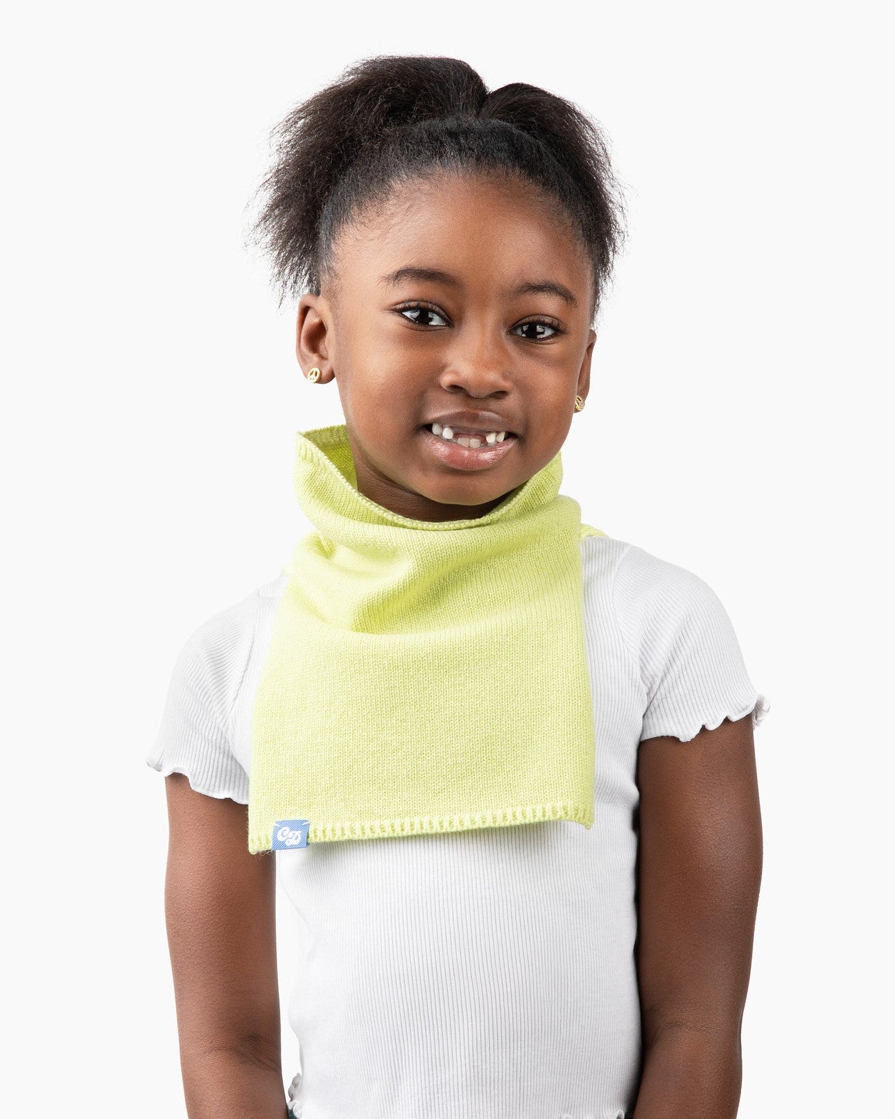 Khali is 7 and wearing size small in stan in lime