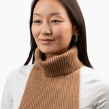 Liz is 5'6" and wears a BIG freddie in camel