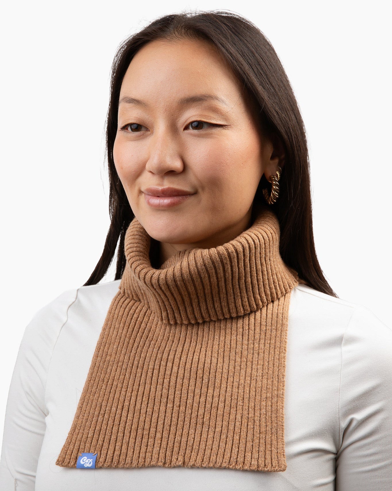 Liz is 5'6" and wears a BIG freddie in camel