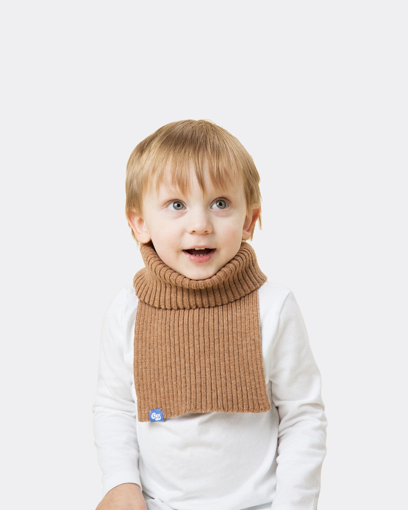 Elio is 3 and wearing a mini freddie in camel