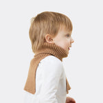 Elio, age 3, wearing freddie in camel in mini