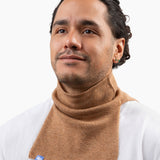 JP wears size M shirts and a BIG stan in camel