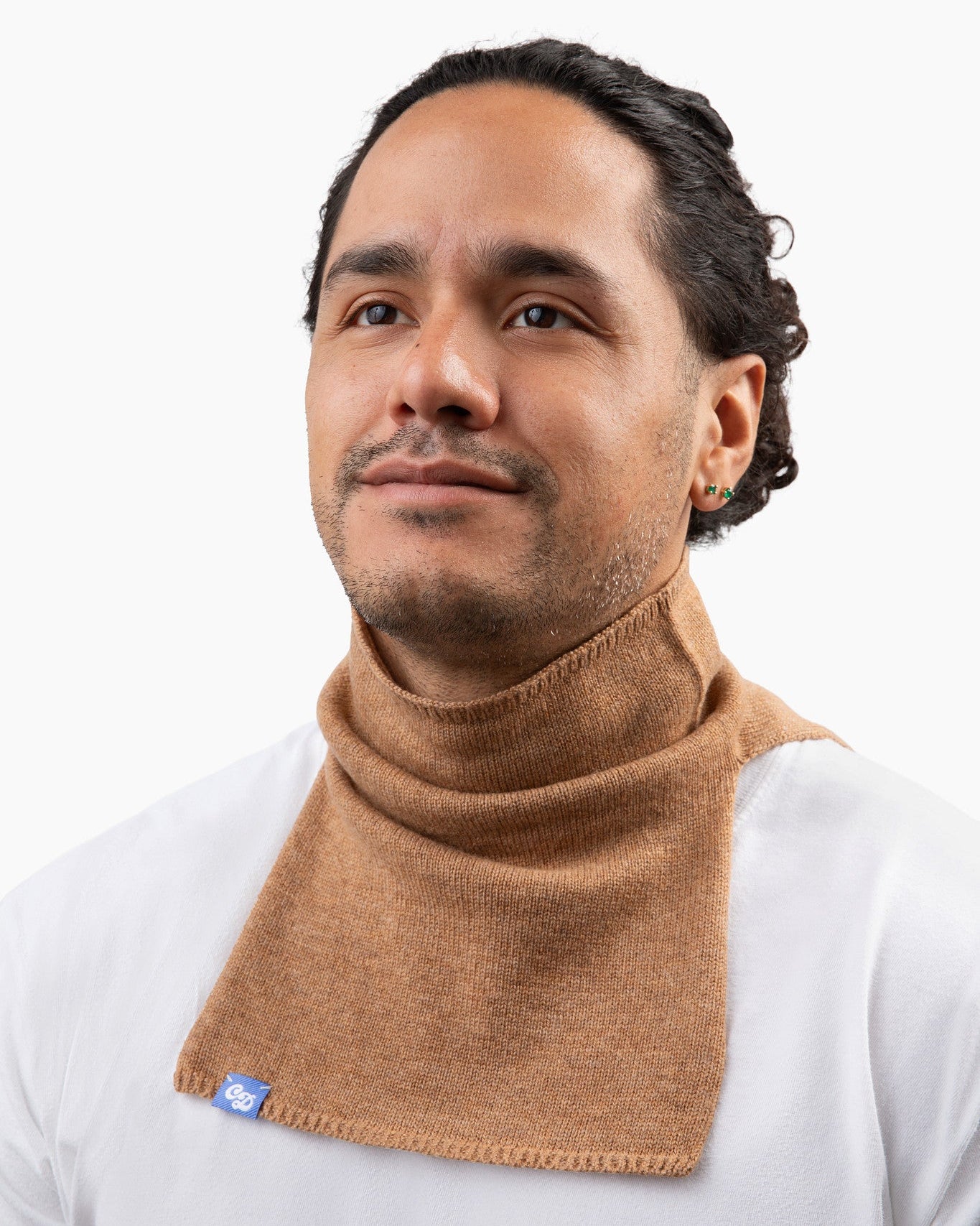 JP wears size M shirts and a BIG stan in camel