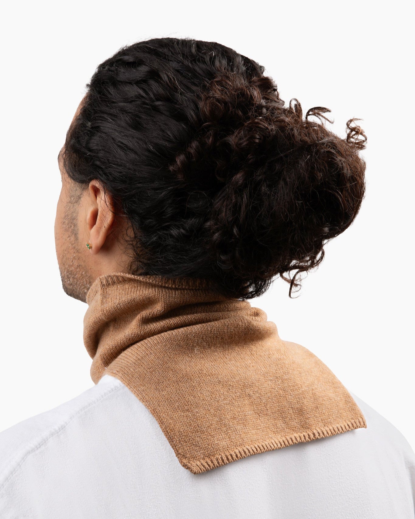 JP wears size M shirts and a BIG stan in camel