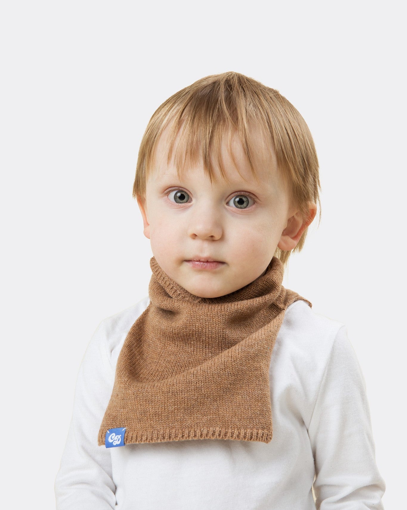 Elio, age 3, wears stan in camel in mini size