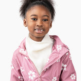 Khali, age 7, wears a small stan in blanc