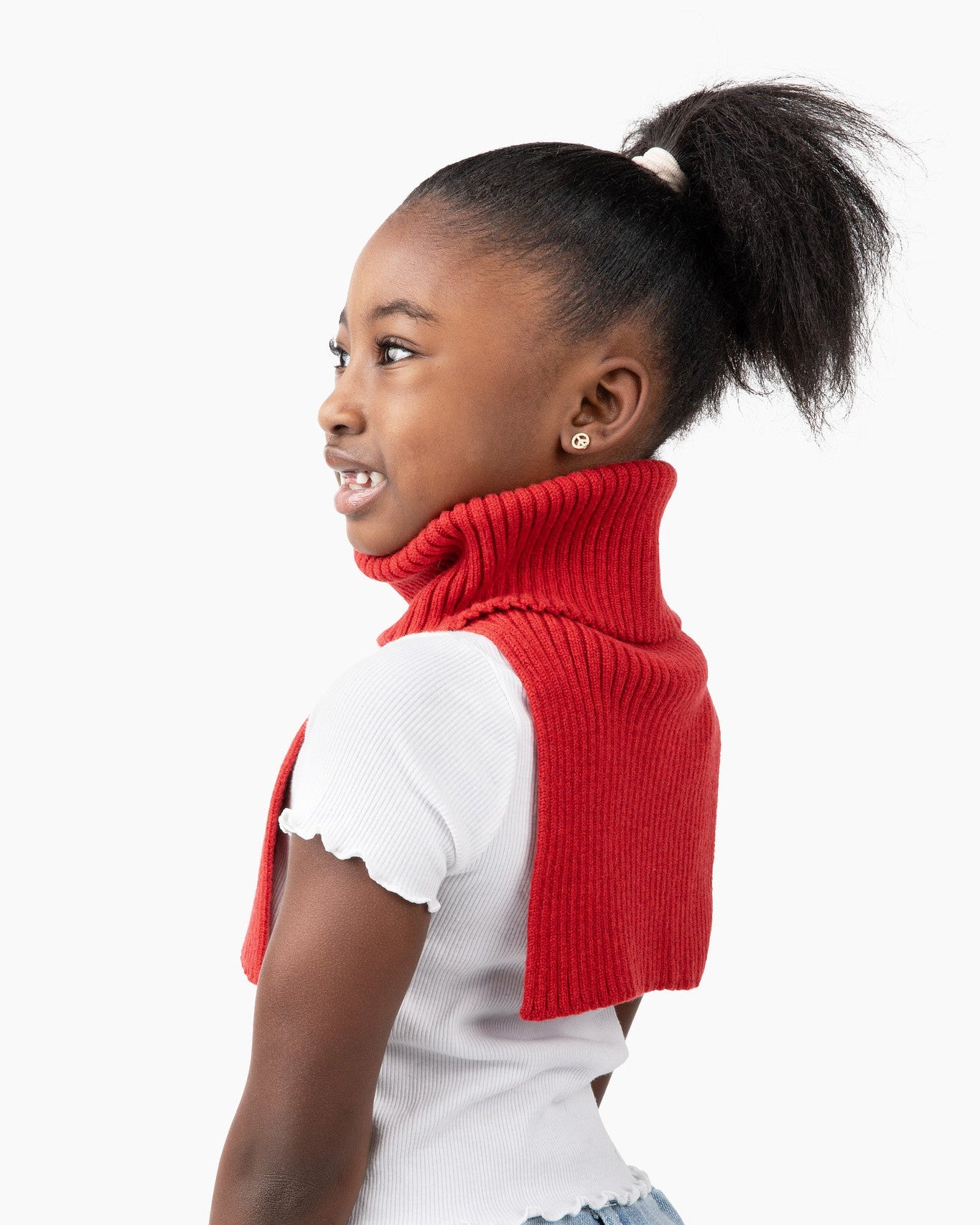 Khali is 7 and wears a freddie in lava in size small